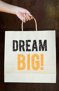 Phrase Dream big on a paper bag