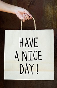 Phrase Have a nice day on a paper bag