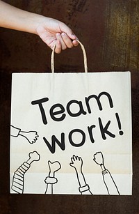 Text Teamwork on a paper bag