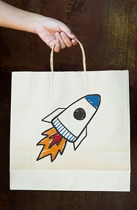 Rocket launch drawing on a paper bag
