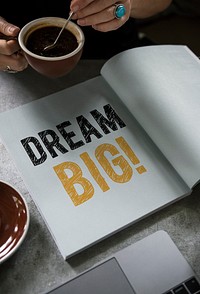 Wording Dream big on a book