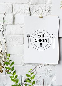 Eat clean food inspiration on paper poster on white wall