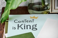 Content is king written on a paper