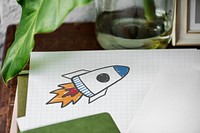 Rocket launch drawn on a paper