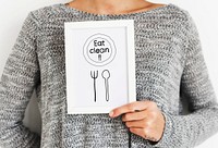 Woman holding an Eat clean frame