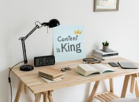 Minimal style workspace with a phrase Content is king