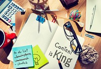 Content is king written in a notebook