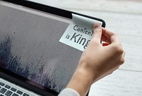 Content is king written on a sticky note