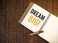 Dream big written on a notebook