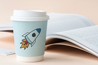 Rocket launch drawn on a paper cup