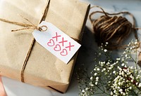 Present box with Hearts and kisses symbols tag