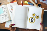 Bitcoin symbols on a notebook