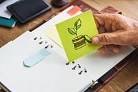 Investment growth concept on a sticky note