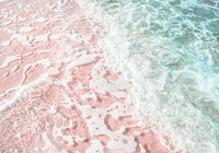 Pastel beach background, pink sand and cleared ocean