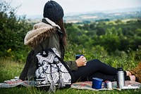 Woman picnic in nature, vivid tone