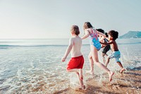 Kids at the beach summer vacation, vivid tone