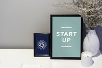 Start up quote and illustration in picture frames