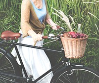 Senior Woman Bicycling Windy Park Concept