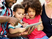 Family using a tablet together