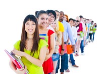 Multi-ethnic group of student holding the book standing in line