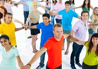 Large group of young multi-ethnic people connecting with each other