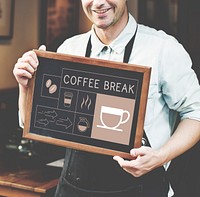 Coffee shop owner holding advertising banner
