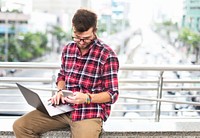 Young Man Using Browsing Smartphone Concept