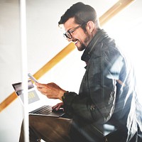 Young Man Smiling Talking Smartphone Concept