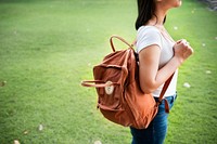 Asian woman carrying a bag