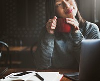 Asian woman drinking coffee