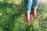 A girl laying in the grass