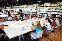 Young students using digital tablets at school