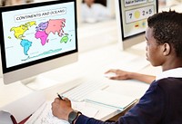 Student learning geography online in a classroom