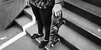 Young Woman Skateboard Standing Outdoors Bridge Concept