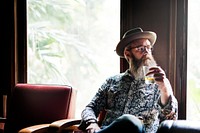 Hipster Man Drinking Relax Concept