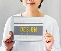 Closeup of asian woman holding digital tablet with design word showing on screen