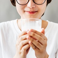 Asian Girl Drinking Milk Beverage Grow Up Relaxation Concept