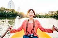 Asian Woman Ride On Boat Concept