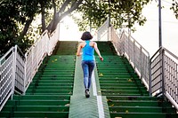 A woman jogging through the city