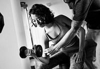 Couple working out together in the gym