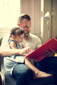 Father Daughter Reading Book Concept