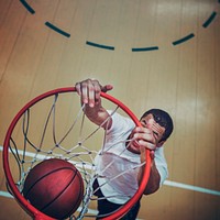 Basketball player making a slam dunk 