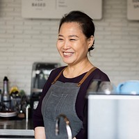 Asian barista woman at coffee shop