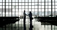 Businessmen Handshake Deal Partnership International Airport Concept