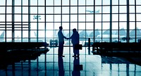 Businessmen Handshake Deal Partnership International Airport Concept