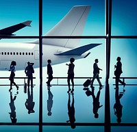 Silhouette Group of Business People with Airplane Concept