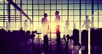 Abstract silhouette of business people and the city