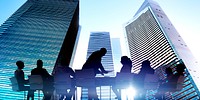 Silhouettes of Business People Meeting Outdoors Concept