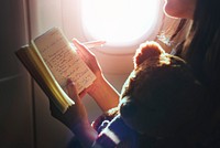 Woman Reading Book Plane Flying Concept