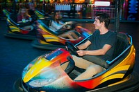 A group of friends is enjoying the amusement park